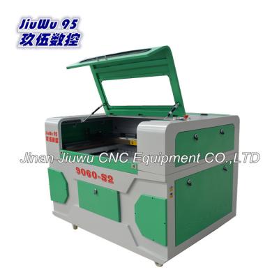 China Laser engraving jinan jiuwu 9060 cnc co2 laser clothing engraving machine price for sale for sale