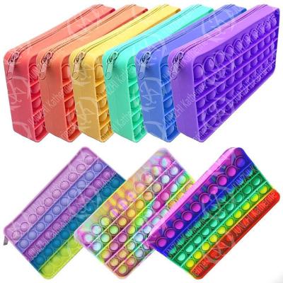 China Schools & Offices Pen Storage Bag Push Bubble Pencil Bags School Kids Rainbow Silicone Stress Relief Push Button Bag Buster Pencil Case for sale