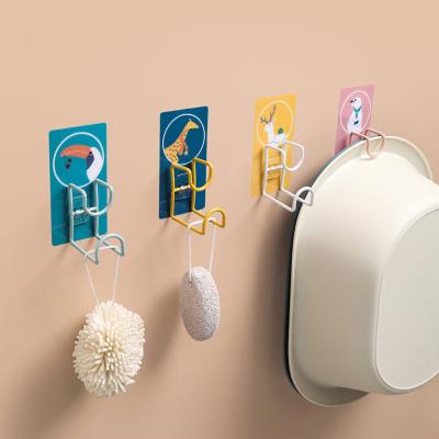 China Net Red Squishy Hook Modern Bathroom Punch Free Hook Hanger Wall Mount Toilet Sink Wall Storage Sink Hook for sale