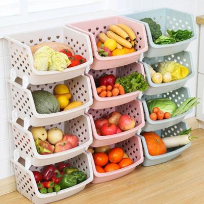 China Viable Creative Storage Basket Hollow Fruit Vegetable Organizer Stackable Hollow Basket Storage Home Kitchen Tool for sale