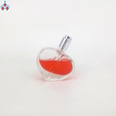 China Personal Care 30ml Heart Shape Glass Bottle Perfume Clear Bottle Transparent Glass Bottle for sale