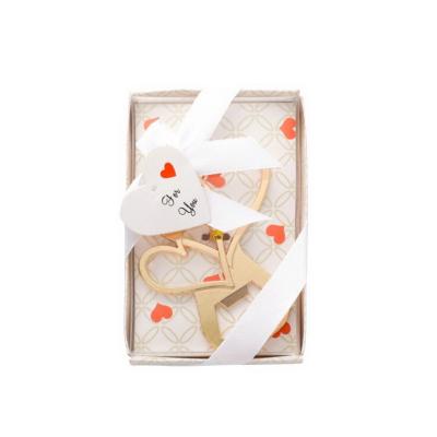 China Wedding Baby Favors Wholesales Amazon Gold LOVE Double Heart Hot Selling Bottle Opener In Gift Box Bridal Shower Favors Wedding Birthday Gift for sale