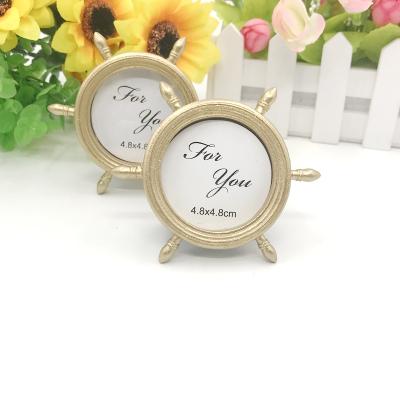 China Wedding Party Decorations Wholesales OEM Gold Ship Wheel Photo View Beach Place Card Holder Nautical Themed Wedding Favors for sale