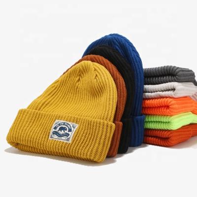 China Custom Label Ski Cap Knit Winter Hat Skullcap Woven Cuff Slouchy Acrylic JOINT Blend for sale