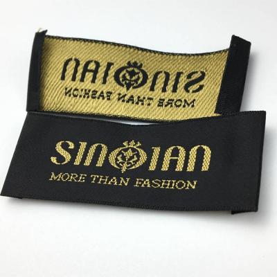 China Customized private logo washable sew on label tag clothing polyester main fabric woven labels for garment for sale