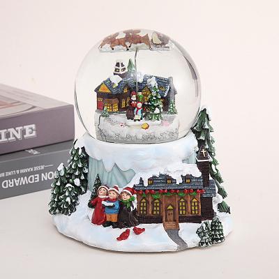 China Europe Rotating Resin Snow Globe Christmas Snowball Music Box Snowflake Snow Globes Decorative Crafts for sale