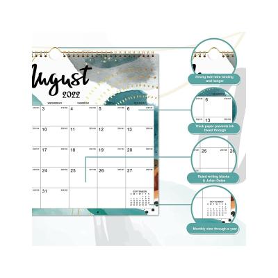 China Spiral Tether/Manufacturer Monthly Weekly Daily Calendar Planner Factory Price Supplier Green Custom Pattern Printing Wall Calendar Wholesale for sale