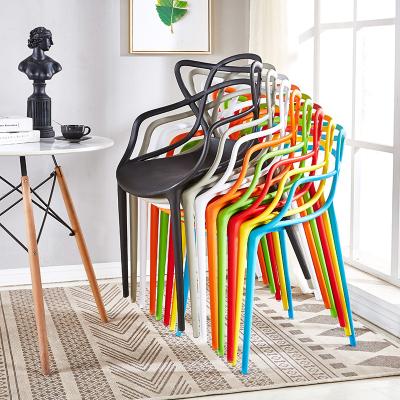 China Stackable Colorful Plastic Dining Table And Chairs From China Factory Stackable Modern Simple Home Furniture With Arms for sale