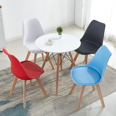 China Modern European Simple Upholstered Dining Room Restaurant Upholstered Cafe Plastic Chair With Wooden Leg for sale