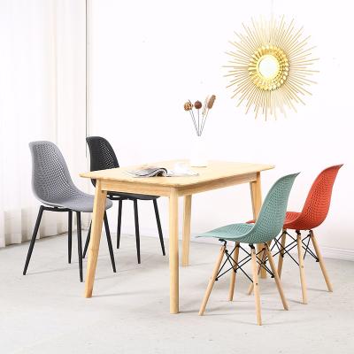 China Modern restaurant furniture pp seat and metal leg colorful hot sale nordic simple dining table and plastic chairs for sale