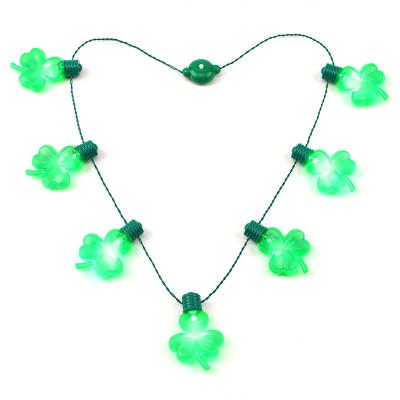 China 7 Led Amazon Hot Sale Holiday LED Lights 7 Clover Luminous Necklace Led Lights String For Party Decoration for sale