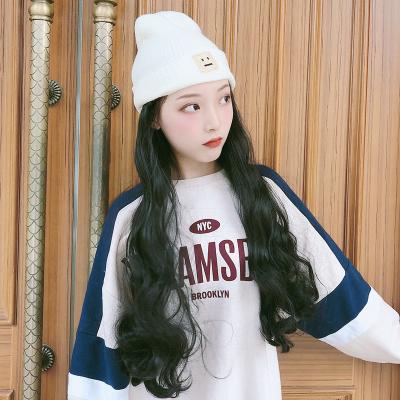 China Easy Apply Wholesale Autumn And Winter Women&'s Fashion Knitted Hat With Long Big Wave Curly Wig for sale