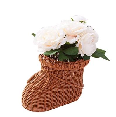 China Eco-friendly PE plastic rattan woven flower rattan vases for home decorative flower pot planter for sale