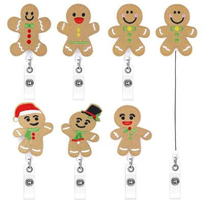 China ID Card Badge Holder Christmas Hand Knitted Cute Red Lip Gingerbread Man Spool Gift Retractable Badge Kids for sale