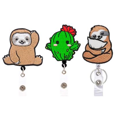 China Retractable Holder Clip Doctor Nurse ID Felt Badge Reel Cute Hand Embroidered Cactus Sloth ID Card Badge Holder Cloth for sale