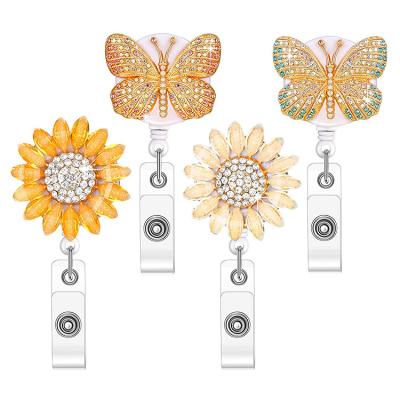 China Cute White Reel Medical Gift Hospital Sunflower ID Card Badge Holder Retractable Bling Rhinestone Badge Holder Accessories for sale