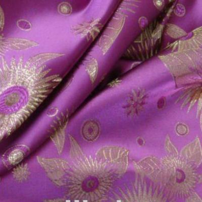 China Stocklot fabric screed prices Polyester satin jacquard tear-resistant fabric for garment in Peru Panama market for sale