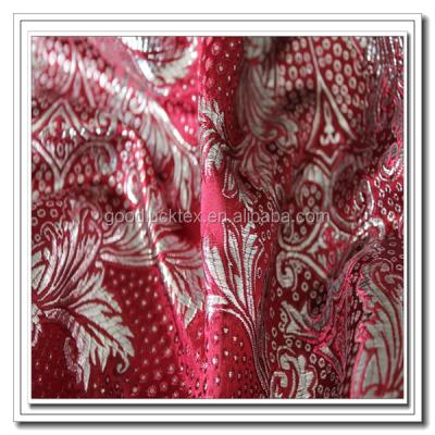 China Guinea brocade embroidery jacquard fusible afcian fabric for sale