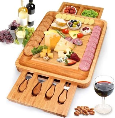 China Disposable Custom Bamboo Cheese Cutting Board Set with Removable Stainless Steel Knife and 2 Slide-Out Drawers Custom Bamboo Bamboo Cutting Board for sale