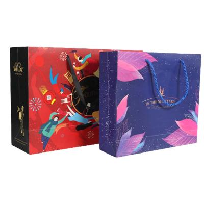 China Recycled Materials Packaging Custom Paper Gift Boxes Logo Printing Paper Bags for sale