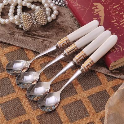 China Minimalist Ceramic Stainless Steel Teaspoon Set With White Handle for sale