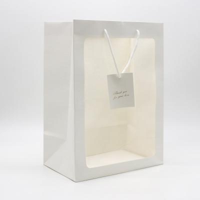 China Recyclable Custom Logo Christmas Chart Embossing Eco Friendly White High Quality Cheaper Stand Pouch With Window Pet PE Paper Bags for sale