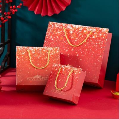 China Recycled Chinese Custom Printed Shopping Recycled Materials New Year Brand Red Luxury Famous Gift Wrapping Paper Materials Recycled Bag With Your Own Logo for sale