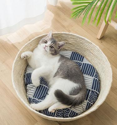 China New Rattan Cat Nest Woven Basket Nest Nature Breathable Straw Pet Cat Nest Summer Breathable Sofa Bed for sale