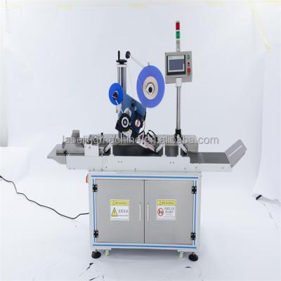 China New designed round bottle food labeling machine automatic flat labeling machine for sale