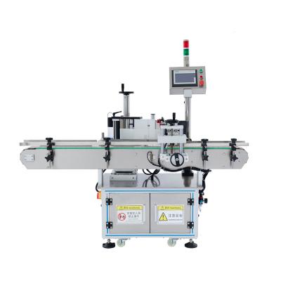 China Food Juice Bottles Capping Filling And Labeling Machine Automatic Round Bottle Sticker Labeling Machine for sale