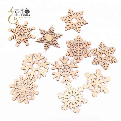 China 2022 Christmas Tree Ornament Customized Good Quality Engraved Snowflake Decoration Exquisite Wooden Christmas Tree Shape Christmas Tree Ornament for sale