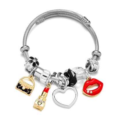 China New FASHIONABLE Designer Exquisite Gadgets Jewelry Bracelet Ladies Heart Lipstick Titanium Steel Lips Charm Bracelet For Women for sale