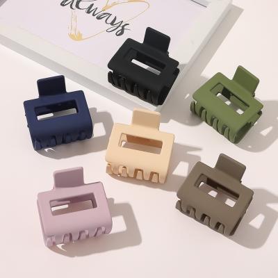 China Comfortable Korean Hollow Claw 5cm Style Solid Color Hair Icing Jaw Fancy Small Size Hair Clips For Women Girls for sale