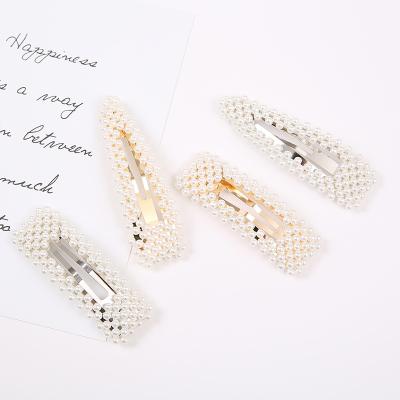 China Hot Selling Korean Gold Fashion Elegant Unique Pearl Hairpin Soft Metal With Pearl Hair Clips For Girls for sale