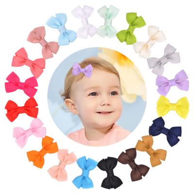 China Hot Selling Daily Border Mini Baby Hair Clips 5 cm Comfy And Healthy Small Size Hair Bow Clips For Babies for sale