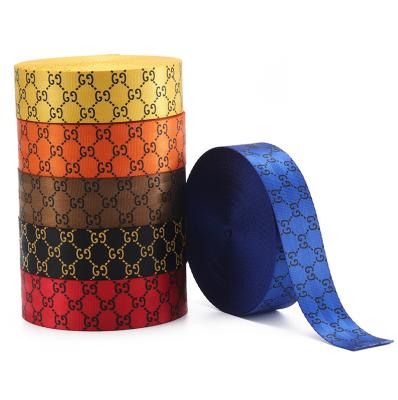 China Custom Made Elastic 100% Polyester Letters Logo Imitation Jacquard Webbing Tape For Shoulder Bag Strap for sale