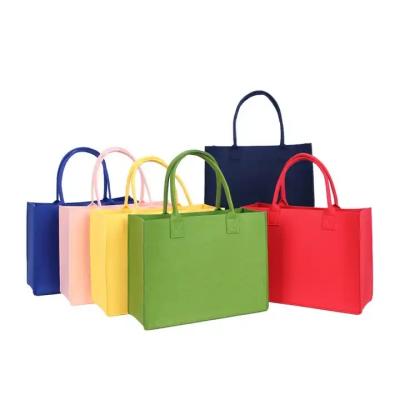 China Custom Printed Eco-Friendly Shopping Paper Bag Logo Eco-Friendly Tote Bags Handbags for sale