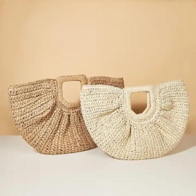 China Fashion Summer Vintage Bohemian Half Moon Shape Solid Color Woven Rattan Round Tote Lady Bags Casual Handbags Beach Bag Portable Straw for sale