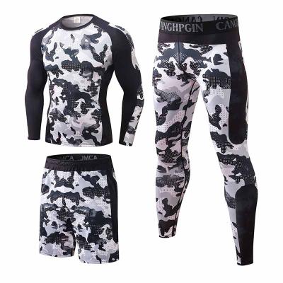 China Wholesale Low Price Tight Upper Elastic Breathable Top Pants Printed Three Piece Men's Fitness Sports Wear Set for sale