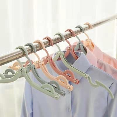 China Modern Portable Space Saving Plastic Folding Hanger Muti Travel Functional Clothes Hanger for Kids and Adults for sale