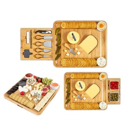 China Eco Friendly Kitchen Disposable Meat And Fruit Dividing Tray Double Drawer Natural Bamboo Cheese Board for sale