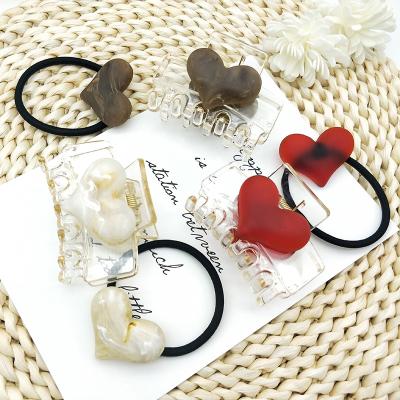 China Daily Wear Fashion Hair Accessories Sets Included Hair Ring And Hari Claw With Customize Love Patterns for sale