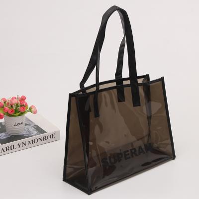 China Safety Wholesale Custom PVC Clear Plastic Shopping Bag With Logo Transparent Handle Bags Packing For Gifts for sale