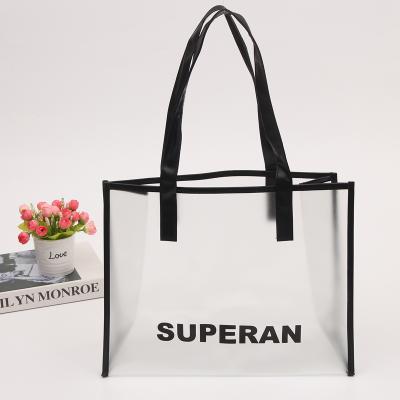 China Custom wholesale waterproof clear fashion security logo PVC transparent tote bag shopping bag with handles for sale