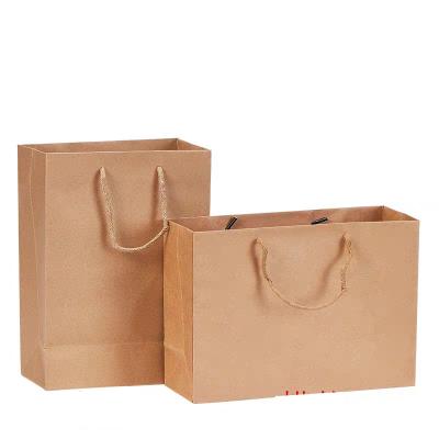 China Recycled materials brown bioldegradable stock bag fashion custom printed kraft paper shopping bag for sale