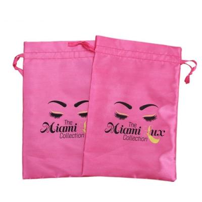 China Gift Custom Logo Wig Bag For Hair Extension Pink Satin Tassel Drawstring Bag Silk Packaging Bags for sale