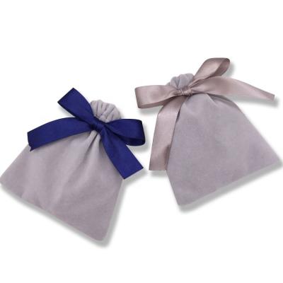 China Recyclable Custom Hot Velvet Candy White Drawstring Bag With Ribbon Bow Knot Suede Velvet Jewelery Pouch Silk Bag for sale