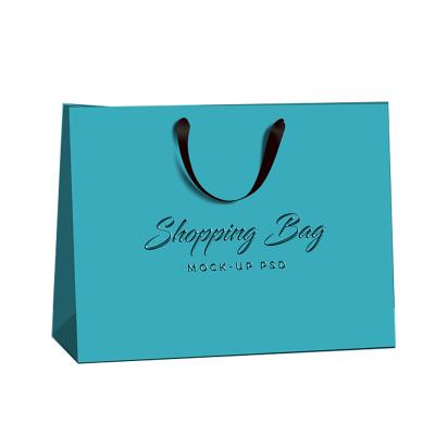 China Recyclable Black Gold Hot Stamping Custom Gift Paper Packaging Carrier Bag With Logo Printed for sale