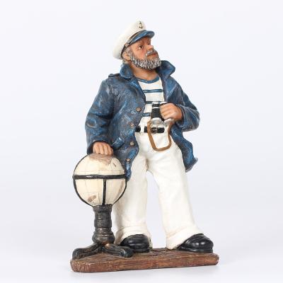 China Captain And Sailor Theme Nautical Figurine Polyresin Mediterranean Style Crafts Decor Home Decor Resin for sale