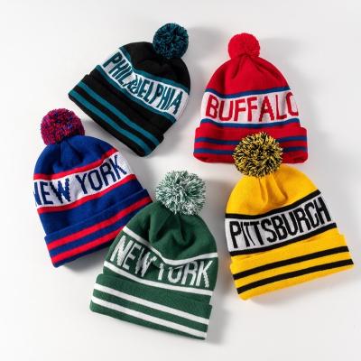 China Wholesale JOINT Ski Bobble Knitted Hats Warm Pom Pom Custom Jacquard Logo Winter Beanie Hats for sale